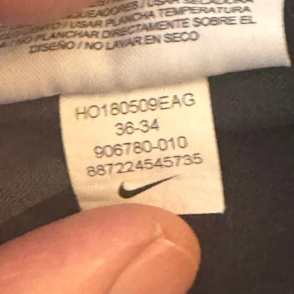 Nike Dri-Fit pants 95% Polyester 5% Spandex Black color Vented cuffs belt loops‎